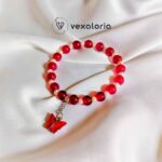 ๐ฆ Elegant Maroon Pearl Butterfly Bracelet โ Stretch Fit with Charm Bead