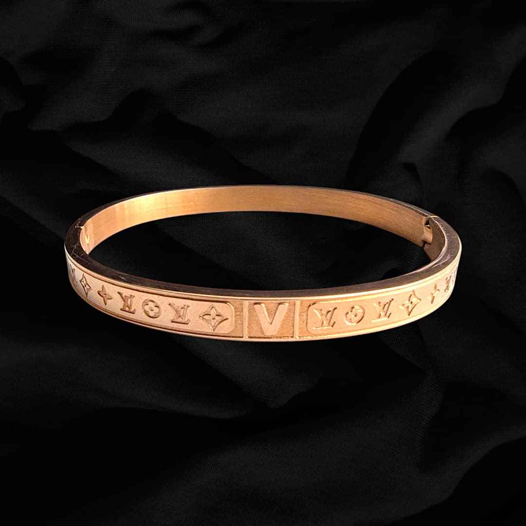WhatsAppImage2025-03-06at02.04.08_3bfa6c40 High Quality Stainless steel LV Design Gold Bracelet